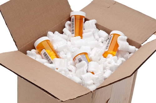 Prescription bottles packaged in shipping box
